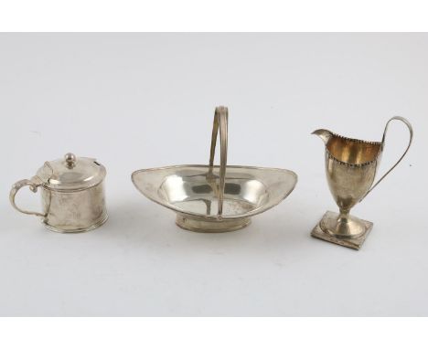 A GEORGE III NAVETTE-SHAPED SWEATMEAT DISH. with a swing handle and reeded borders, maker's mark rubbed, London 1796, a Willi
