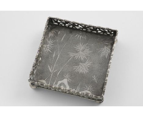 A LATE 19TH CENTURY CHINESE SMALL TRAY OR DISH. square, with a pierced gallery, engraved in the centre with bamboo plants and