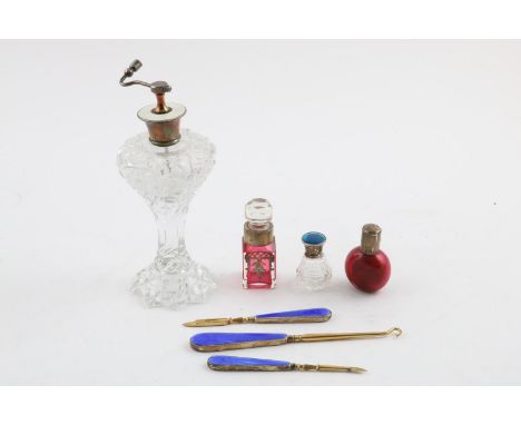 A MIXED LOT:-. a George V mounted cut glass perfume bottle (lacking atomiser), two Victorian mounted red glass scent bottles,