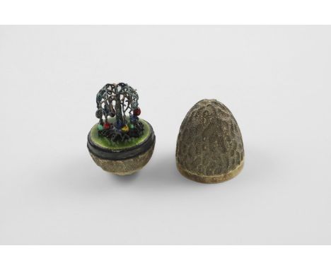 BY STUART DEVLIN:-. a late 20th century silvergilt "surprise" egg, with a textured surface, opening to reveal a tree, with ra