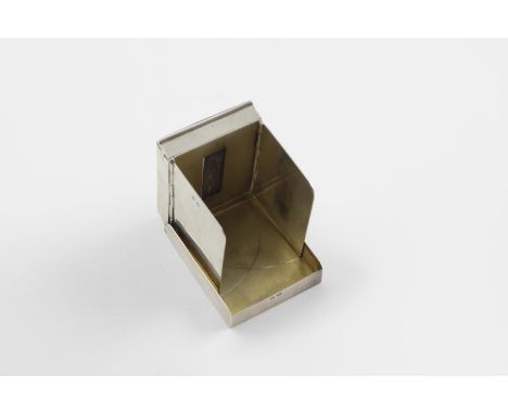 A GEORGE V "POP-UP" VESTA CASE. the body opening to reveal two hinged flaps that form a stand and reveal the striker, the fro