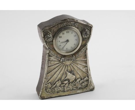 AN ARTS AND CRAFTS MOUNTED WOODEN CLOCK. embossed with a ship at rough sea, "THE HOUR" above the face and "TIME &amp; TIDE WA