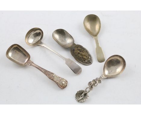 A GEORGE IV NATURALISTIC CADDY SPOON. with a plain drop bowl and a cast stem*, initialled, probably by Robert Gainsford, Shef