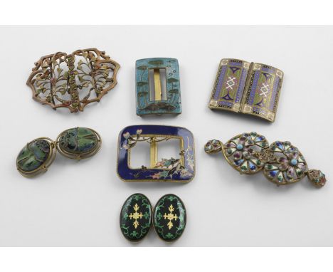 6 ENAMEL BUCKLES:-. late 19th/early 20th century, one with fish underwater amongst lilies, one with scarabs, one with a thist