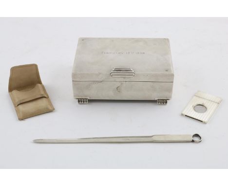 AN ELIZABETH II LETTER OPENER. by Tiffany &amp; Co, Birmingham 1959, together with an Elizabeth II cigarette box with a cedar