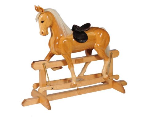 Henry Maas, a handcrafted light oak trestle rocking horse, label, 90cm high (to tip of ear), the trestle base 147cm long