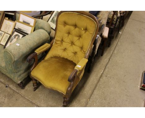 A Victorian mahogany button back armchair