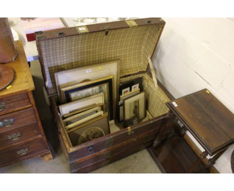 A metal and wooden bound dome topped travelling trunk 