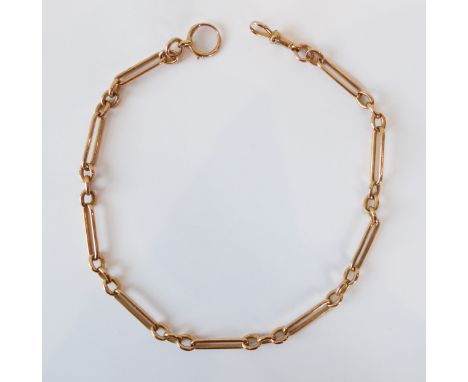 A 15ct rose gold Albert or fob chain - the chain with alternate paperclip and trios of cable links, with a swivel Albert fast