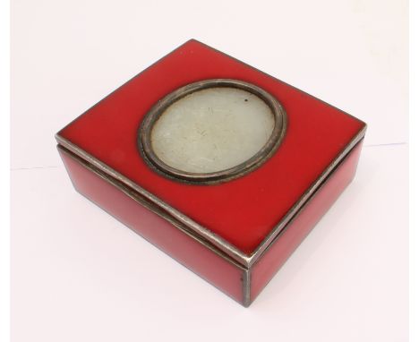 A 19th century white metal and red enamelled box (probably French (the head of Minerva to the underside)). The hinged top cen