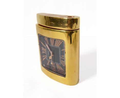 A Dunhill novelty gold-plated travel clock in the form of a cigarette lighter: 1980s, signed to stainless steel caseback, ref