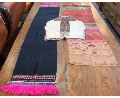 A Burmese hill tribe female embroidered bodice piece: probably Lisu tribe, with embroidered central vertical panel of geometr
