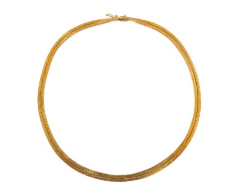 A vintage 18ct yellow gold two strand necklace - 1970s-80s, Italian, with flexible, bark effect links and box clasp, 44 cm lo