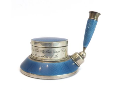 A fine American silver and guilloché enamel pen-holder and stamp-dispenser; the dispenser engraved 'Presented to Sir Arthur C