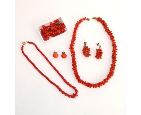 Two vintage coral necklaces - one with graduated beads and yellow gold spring ring clasp, 34.25 cm long; the other with gilt 