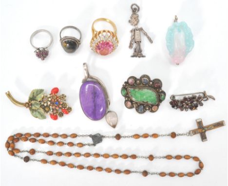 A collection of silver and white metal jewellery. To include a Chinese jade hardstone and filigree brooch pin signed HK, a la