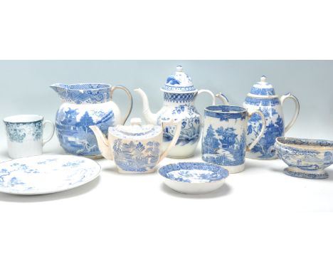 A collection of 19th and early 20th century blue and white ' willow ' pattern ceramics to include teapots, large creamer jug,