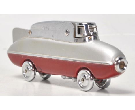 A mid 20th Century 1950's Sarome Bluebird novelty cigarette lighter, finished in red and grey with chrome details, chrome whe
