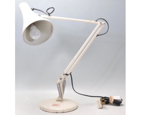 A vintage 20th Century Herbert Terry Anglepoise industrial desk lamp finished in white enamel colourway. Raised on circular b