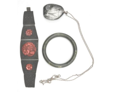 A Chinese cinnabar and white metal strap bracelet inset with inset cinnabar roundels. The verso stamped CHINA. Together with 