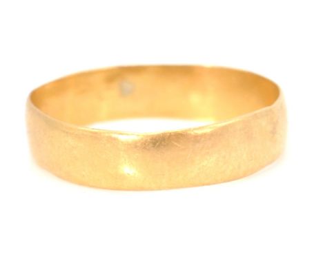A hallmarked 22ct gold band ring of plain form. Hallmarked Birmingham 1893, makers marks for HS. Weight 1.7g. Size K.5.