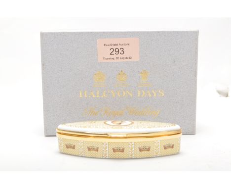 A Halcyon Days enamels navette shaped trinket box enamelled throughout with white and gilt decoration with a portrait of Will