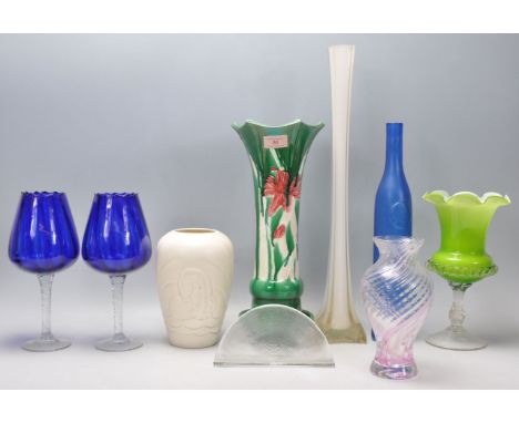 A mixed group of ceramic and glassware pieces to include a pair of crumpled rim wine glasses having blue glass bowls, green g