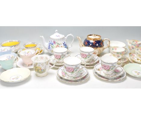 A collection of mixed vintage bone china tea service items, brands include Foley, Royal Doulton, Crown Staffordshire, Bramble