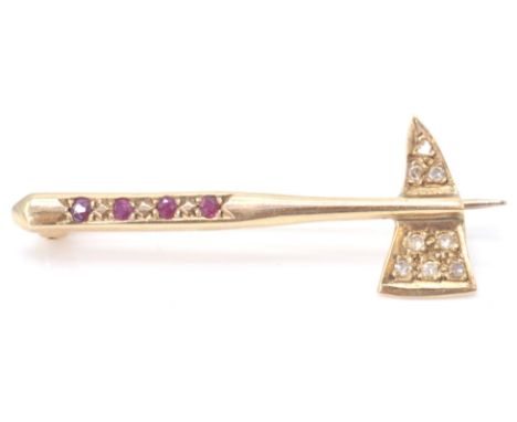 A 9ct gold bar brooch in the form of an axe inset with diamonds and garnets, pin verso. Total weight 3.78g / Measures 4cm app