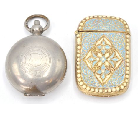 A gilded white metal and enamel 20th century match vesta. The champleve turquoise and enamel worked sides with strike to the 