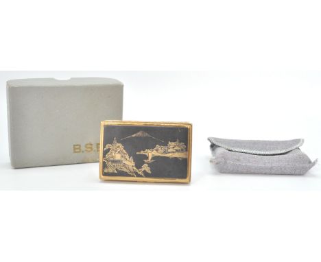 A good vintage 20th Century musical compact by B.S.B having a Japanese scene atop with mount Fuji in the distance. Within ori