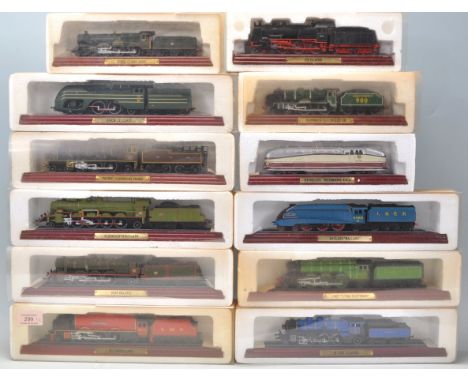 A group of twelve boxed 00 Gauge model trains on wooden plinth bases to include The Flying Scotsman, Duchess LMS, A4 Class "M