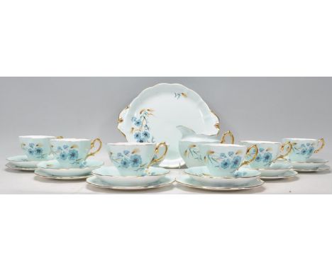 An vintage 20th Century Royal Albert fine bone china tea service all decorated in floral sprays and gilt trims consisting of 