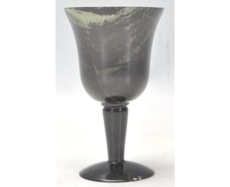 A vintage Chinese Han style black jade wine cup.