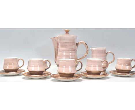 A vintage retro 20th Century Rye pottery coffee service consisting of coffee pot, six cups and saucers, creamer jug and sugar