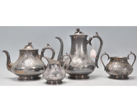 An early 20th Century good quality silver plate tea and coffee service having raised and engraved leaf decoration throughout.