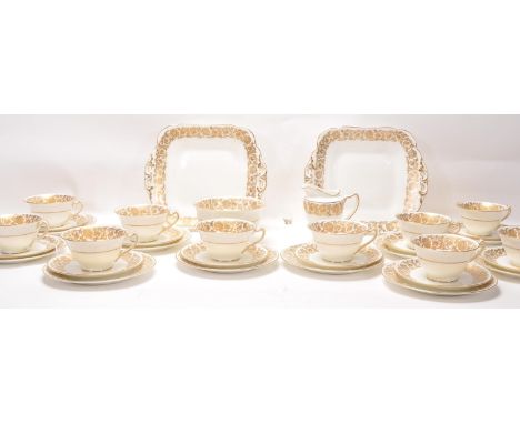 Crescent China - A Fine Bone China English part tea service by&nbsp;George Jones for Crescent China having gilt floral decora