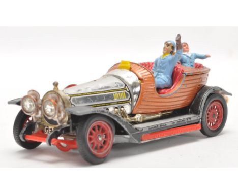 A vintage Corgi Toys Chitty Chitty Bang Bang diecast car with figures with cold painted detailing.&nbsp;