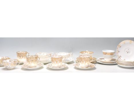 A mixed group of&nbsp;Fine Bone China English tea cups and saucers dating from the 19th Century and later to include mostly g