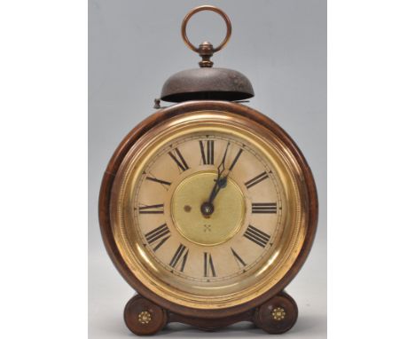 A good 19th Century Victorian German oak barrel mantel clock having a cream face having Arabic numeral chapter ring with stri