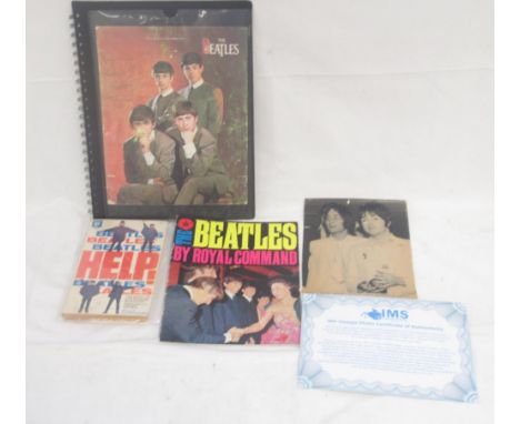 Beatles -  folder cont. 14 negatives and transparencies relating to the Beatles, some framed in cardboard 'London Features In