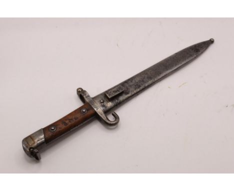 Austrian M1885 NCO bayonet complete with scabbard. With crossed out serial no. 74011 to guard and a second no. 125054 to vers