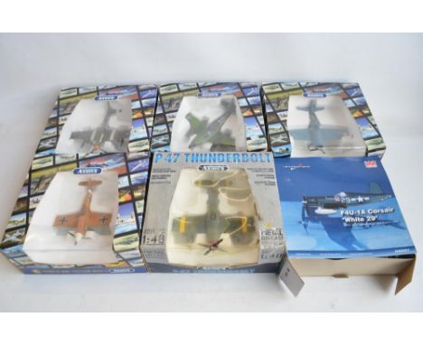 Seven 1/48 scale diecast WWII fighter aircraft models from Hobbymaster and The Armour Collection, all damaged and or missing 