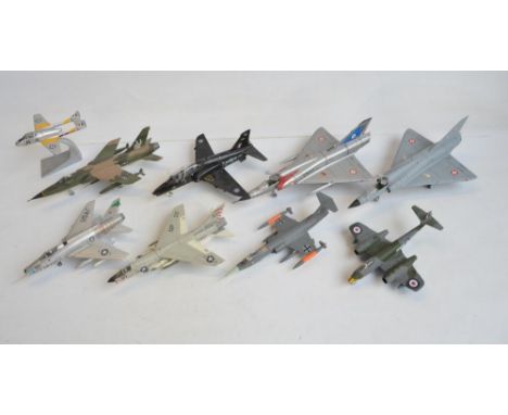 Nine unboxed diecast jet aircraft models in 1/48 and 1/72 scales, various manufacturers to include The Armour Collection, Squ