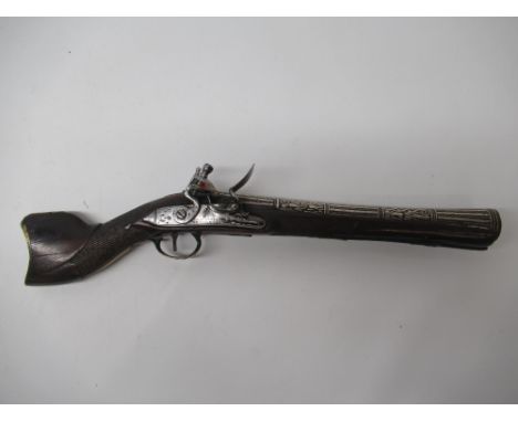 19th Century Turkish flintlock knee blunderbuss, 12" barrel with silver (white metal) inlaid detail and flared muzzle, cheque