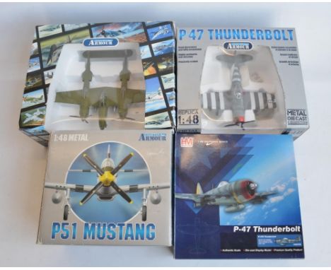 Four boxed 1/48 scale diecast WWII USAAF fighter aircraft models to include Hobbymaster P-47D Thunderbolt 'Oh Johnnie' (model