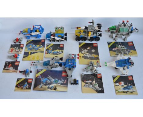 Ten vintage Lego Space sets circa late 1970's-80's to include sets 885, 889, 891, 6805, 6890, 6892, 6927, 6931, 6940 and 6950