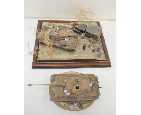 A pair of highly detailed and very well constructed 1/35 scale plastic model WWII dioramas depicting German Army King Tigers 