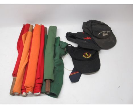 Seven guard's hand held flags, probably South African Railways, L53cm; four railway related baseball caps and clip on tie