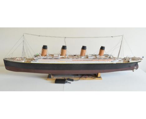 RMS Titanic built kit model from Trumpeter with added upper deck lighting (runs off USB, also has a 9V battery connector alth
